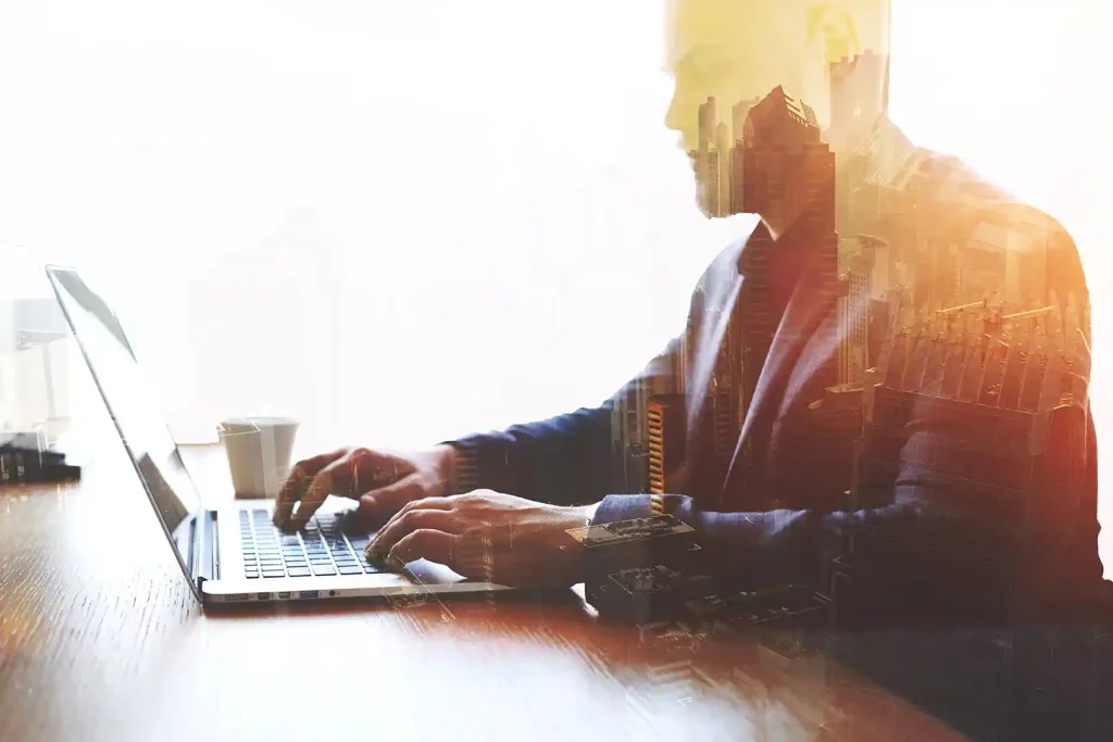 Professional web developer working on a laptop — WeGo.ca website expert serving Ontario businesses