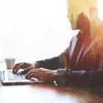 Professional web developer working on a laptop — WeGo.ca website expert serving Ontario businesses